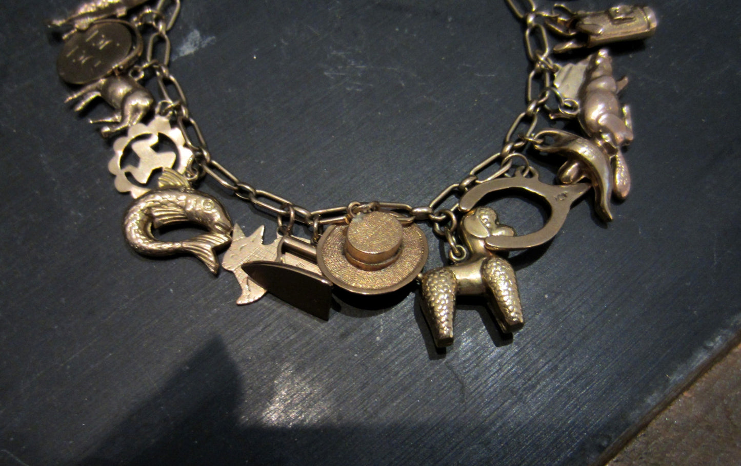 SOLD--Mid-Century Charm Bracelet 9k/18k Rose Gold, British c. 1948-51