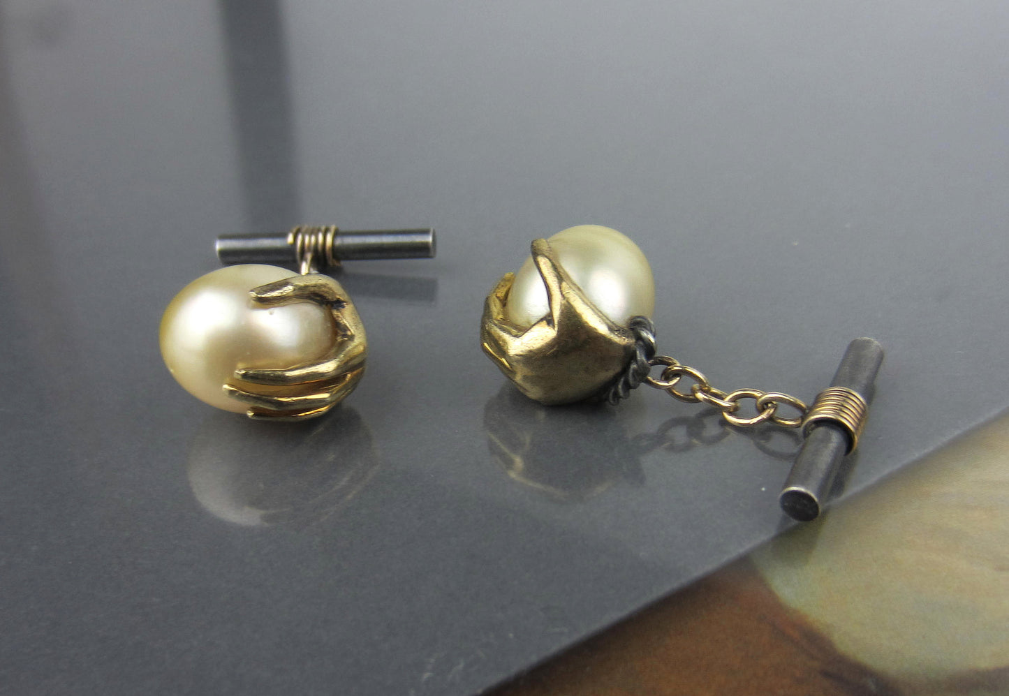 SOLD--Mid-Century Hand Holding a Pearl Egg Cufflinks 18k and Sterling c. 1960