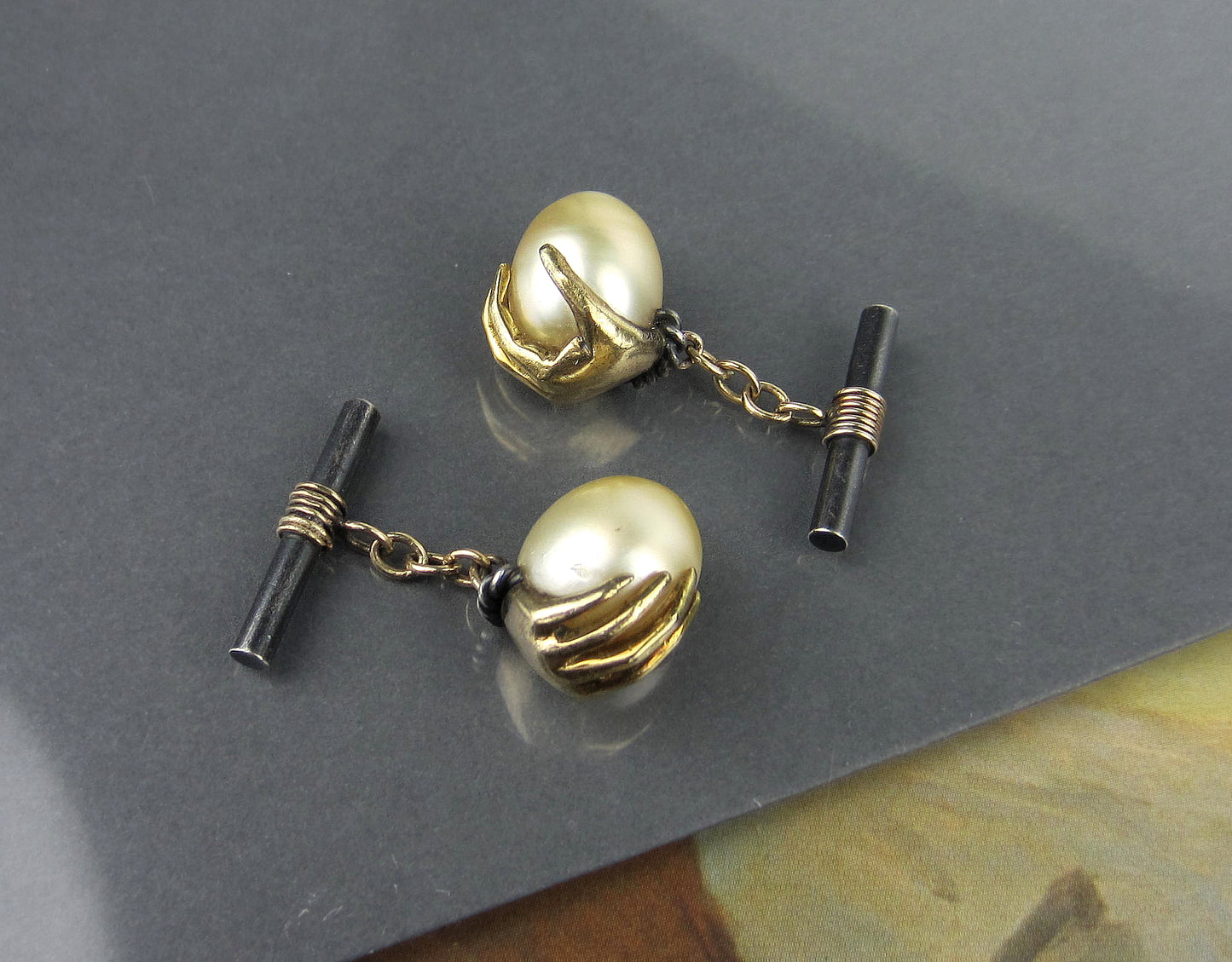 SOLD--Mid-Century Hand Holding a Pearl Egg Cufflinks 18k and Sterling c. 1960