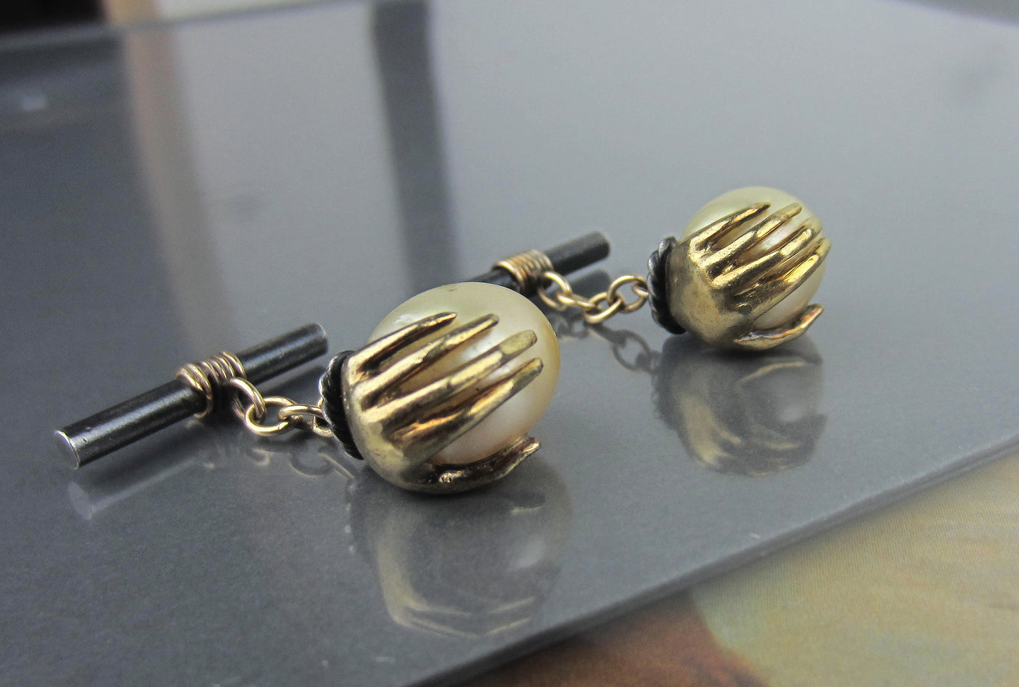 SOLD--Mid-Century Hand Holding a Pearl Egg Cufflinks 18k and Sterling c. 1960