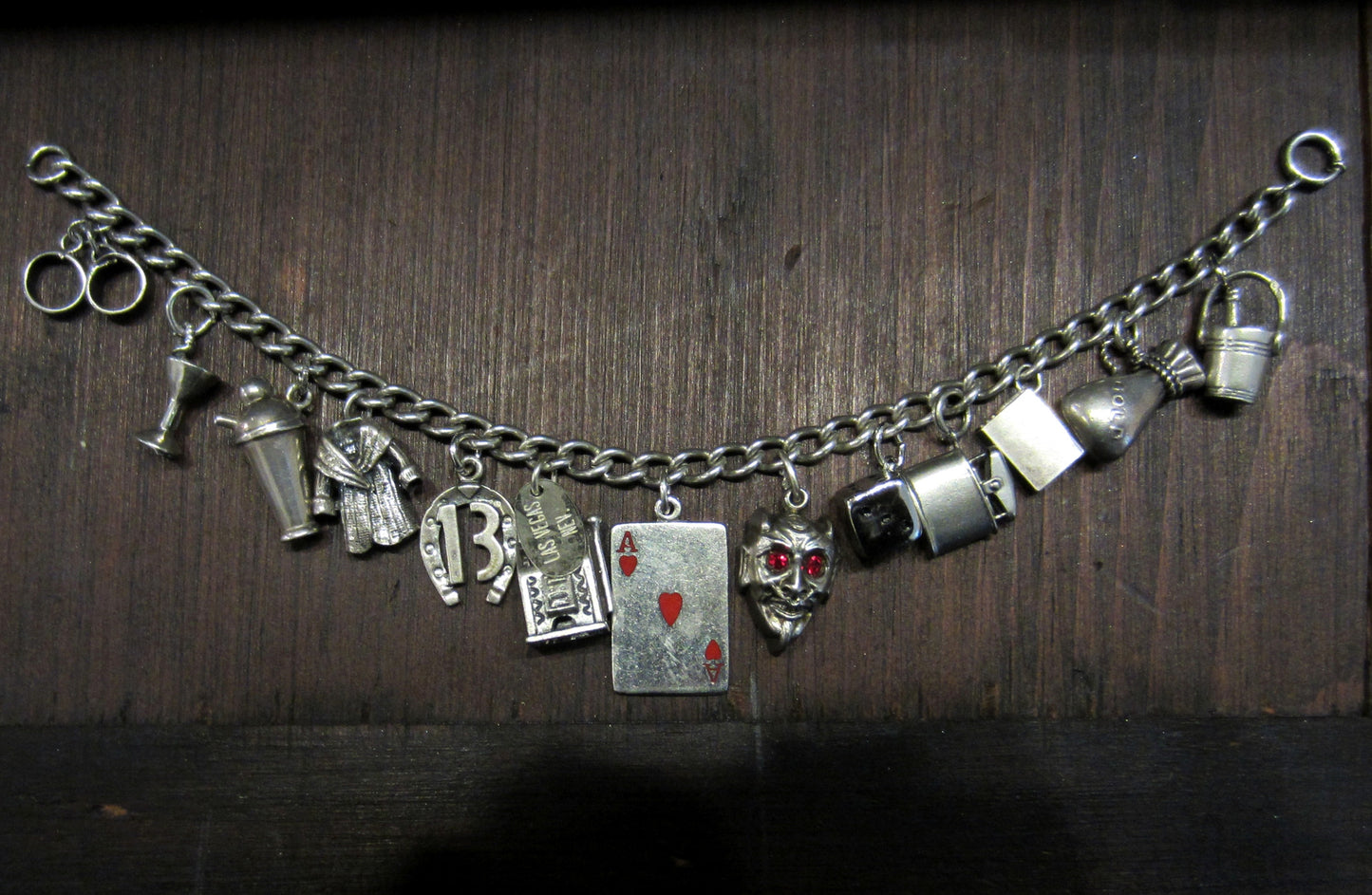 SOLD--Vintage "Vices" Charm Bracelet in Sterling Silver, c. 1920-1950