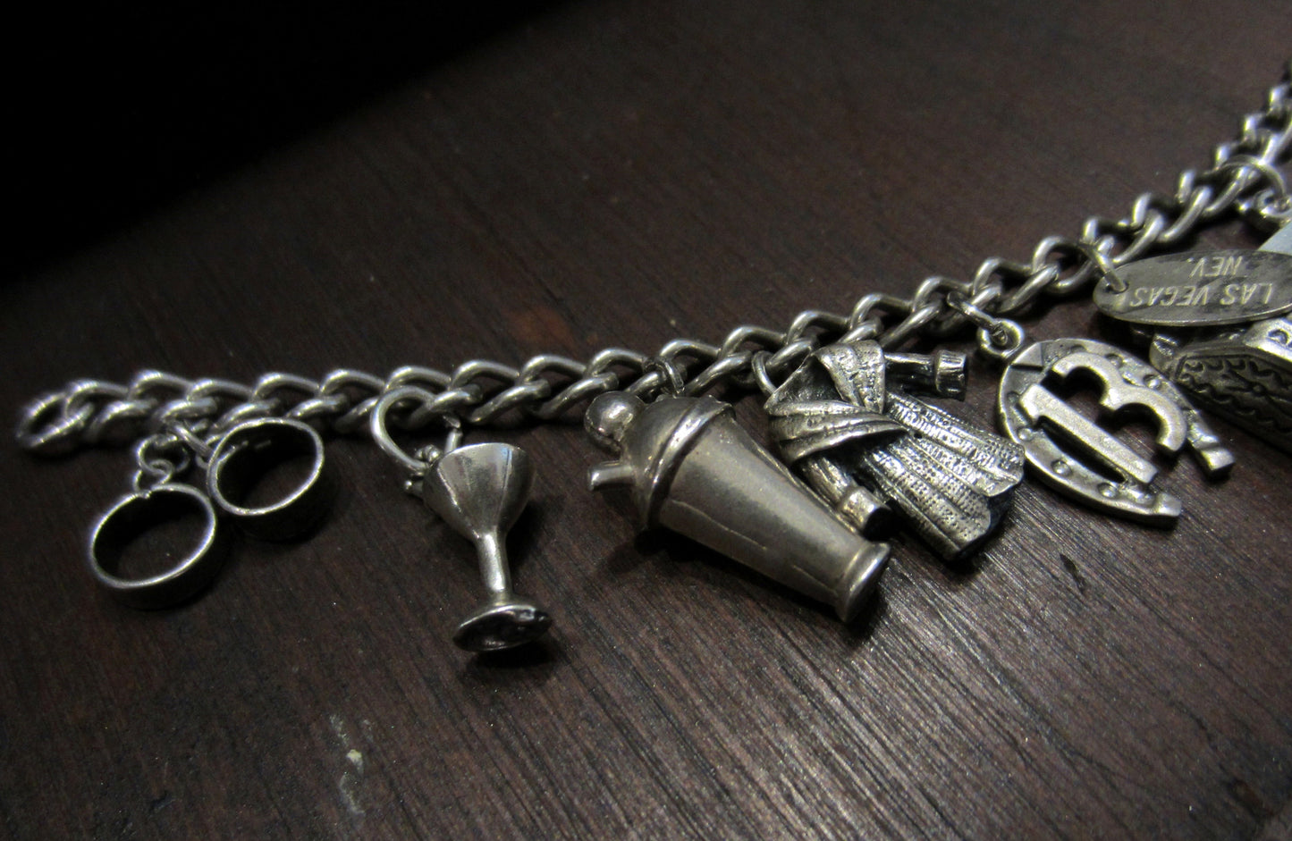 SOLD--Vintage "Vices" Charm Bracelet in Sterling Silver, c. 1920-1950