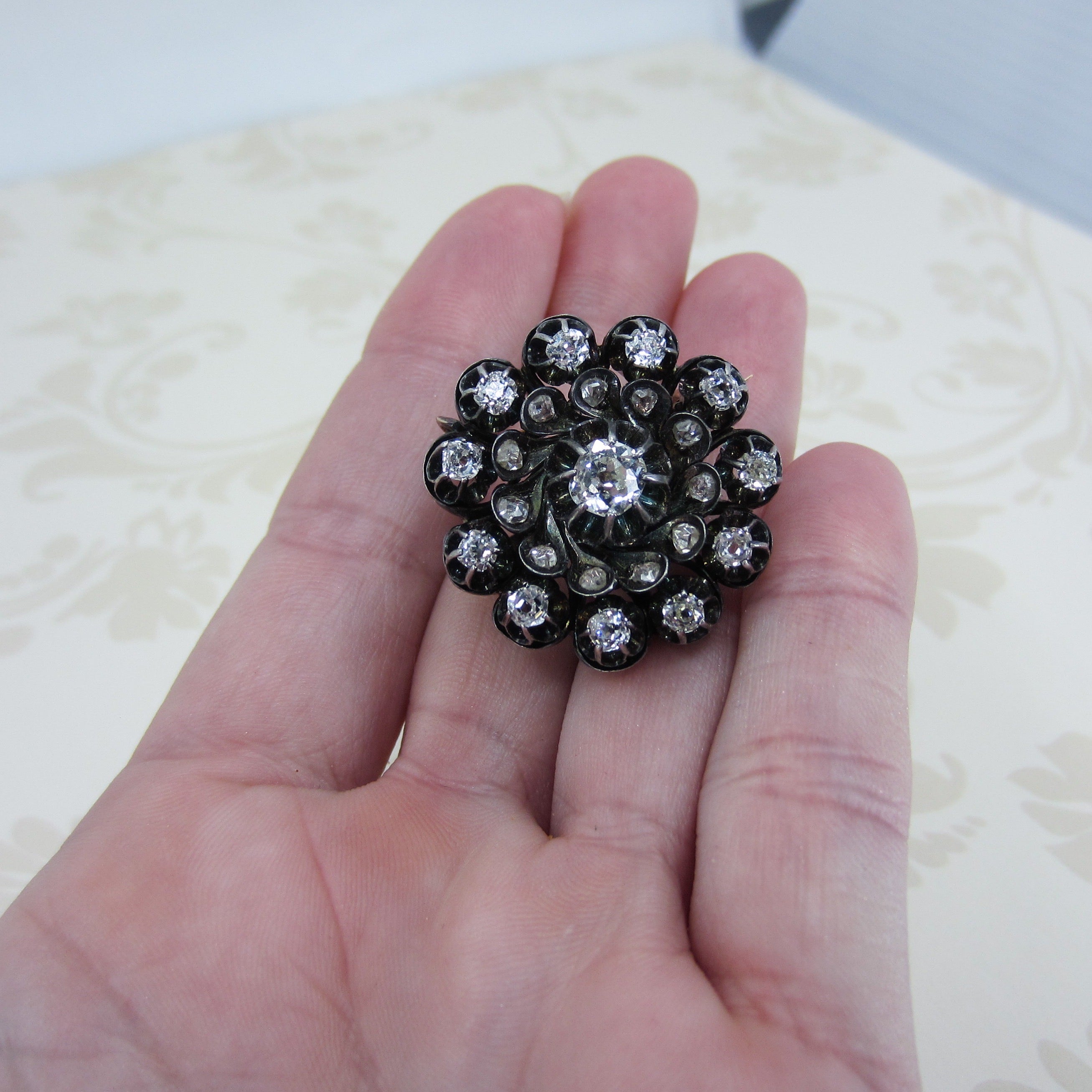 Black on sale diamond brooch